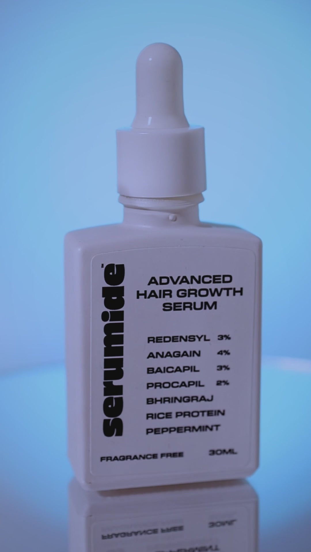 Close-up aesthetic shots of hair growth serum product